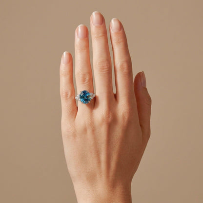 14K 5.62ct Oval Blue Zircon 0.35cttw VS White Diamonds Ring