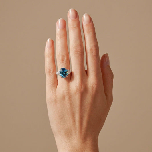 14K 5.62ct Oval Blue Zircon 0.35cttw VS White Diamonds Ring