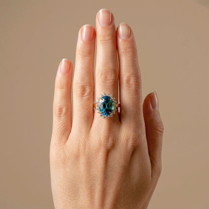 14K 9.29ct Oval Blue Zircon 0.72cttw VS White Diamonds Ring