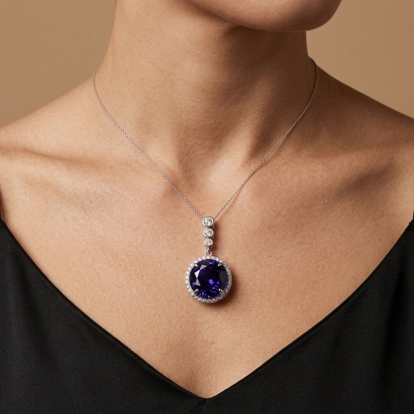 14K 23.95ct Round Blue Wing Tanzanite 1.63cttw VS White Diamonds Pendant