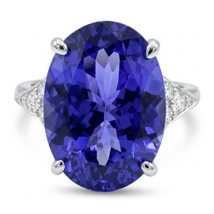 14K gold oval Blue Wing Tanzanite ring with VS white diamonds
