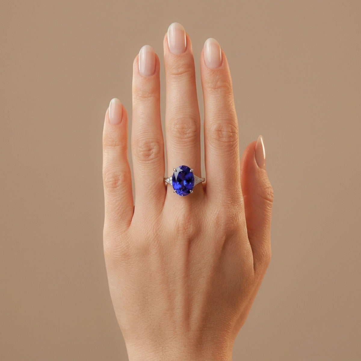 14K gold 6.45ct oval Blue Wing tanzanite ring with VS white diamonds