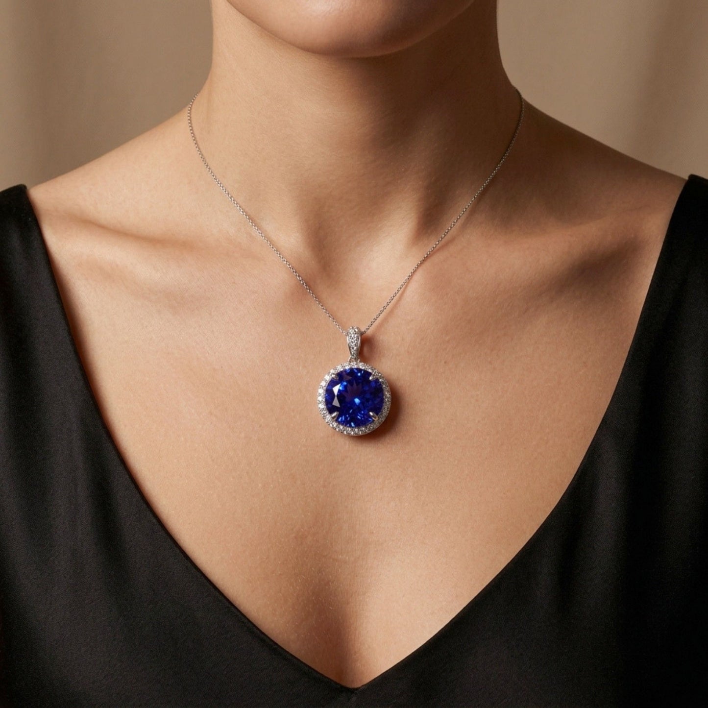 14K 17.55ct Round Blue Wing Tanzanite 1.06cttw VS White Diamonds Pendant