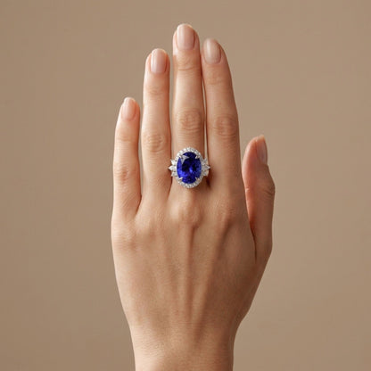 14K 9.15ct Oval Blue Wing Tanzanite 0.98ct VS White Diamonds Ring