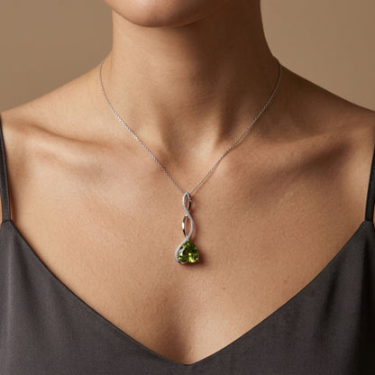14K 2.50ct Heart Shape Peridot 0.15cttw VS White Diamonds Pendant