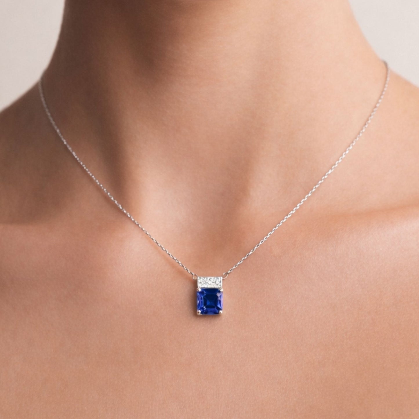 14K 1.70ct Asscher Cut Blue Wing Tanzanite 0.12cttw VS White Diamond Pendant