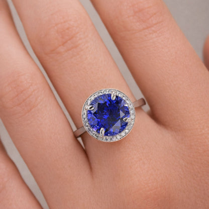 14K 5.45ct Round Blue Wing Tanzanite 0.20cttw VS White Diamonds Ring