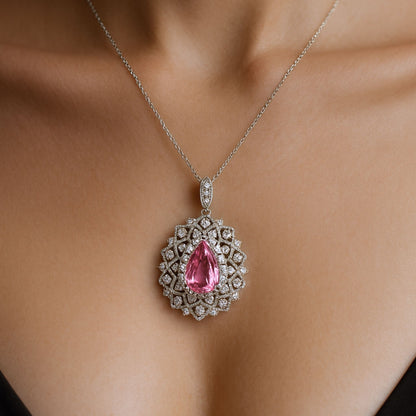 Platinum 3.63ct Pear Shape Pink Imperial Topaz 1.01cttw White Diamonds Pendant